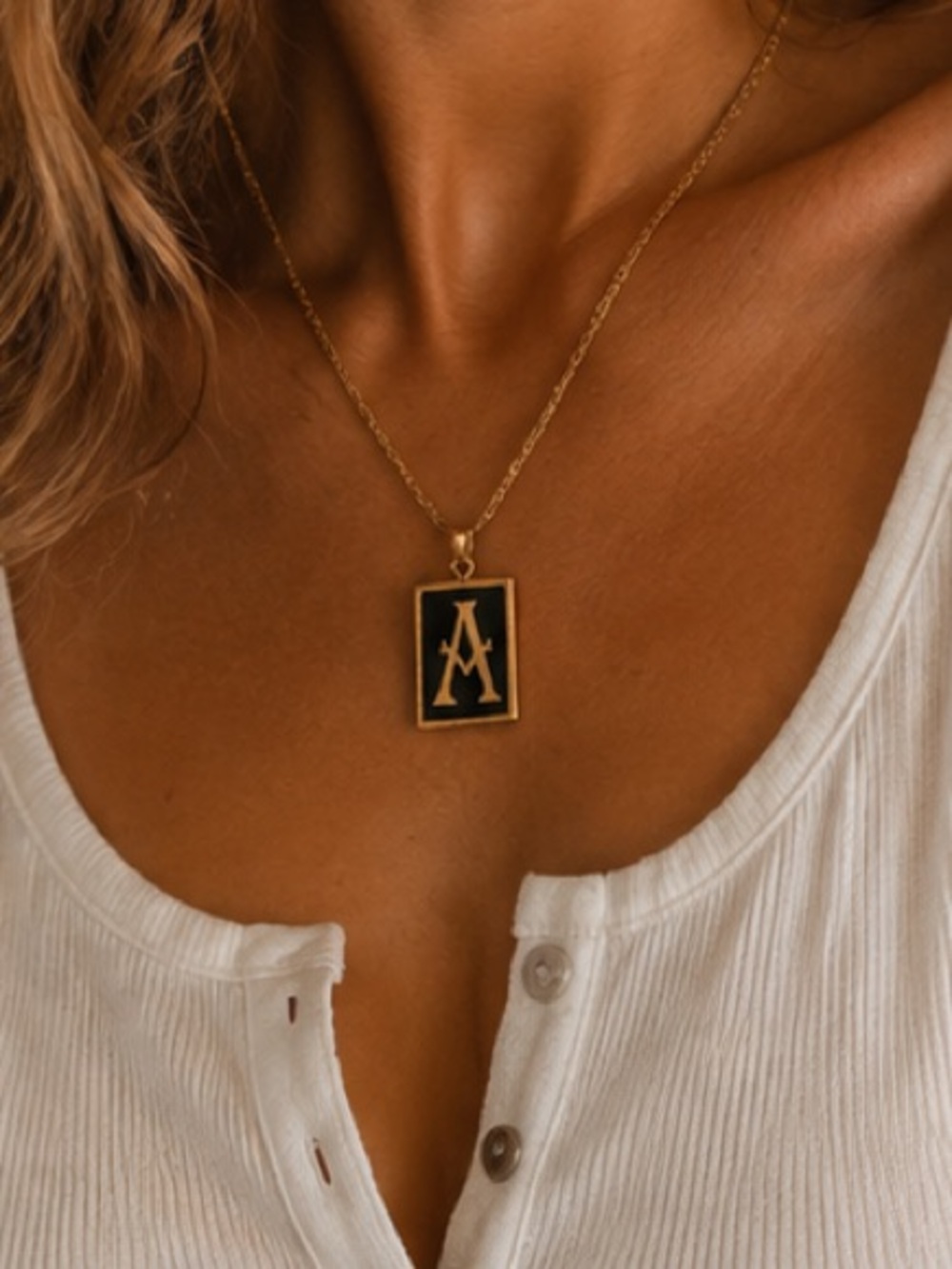 Nwt letter A necklace black with golden color accents